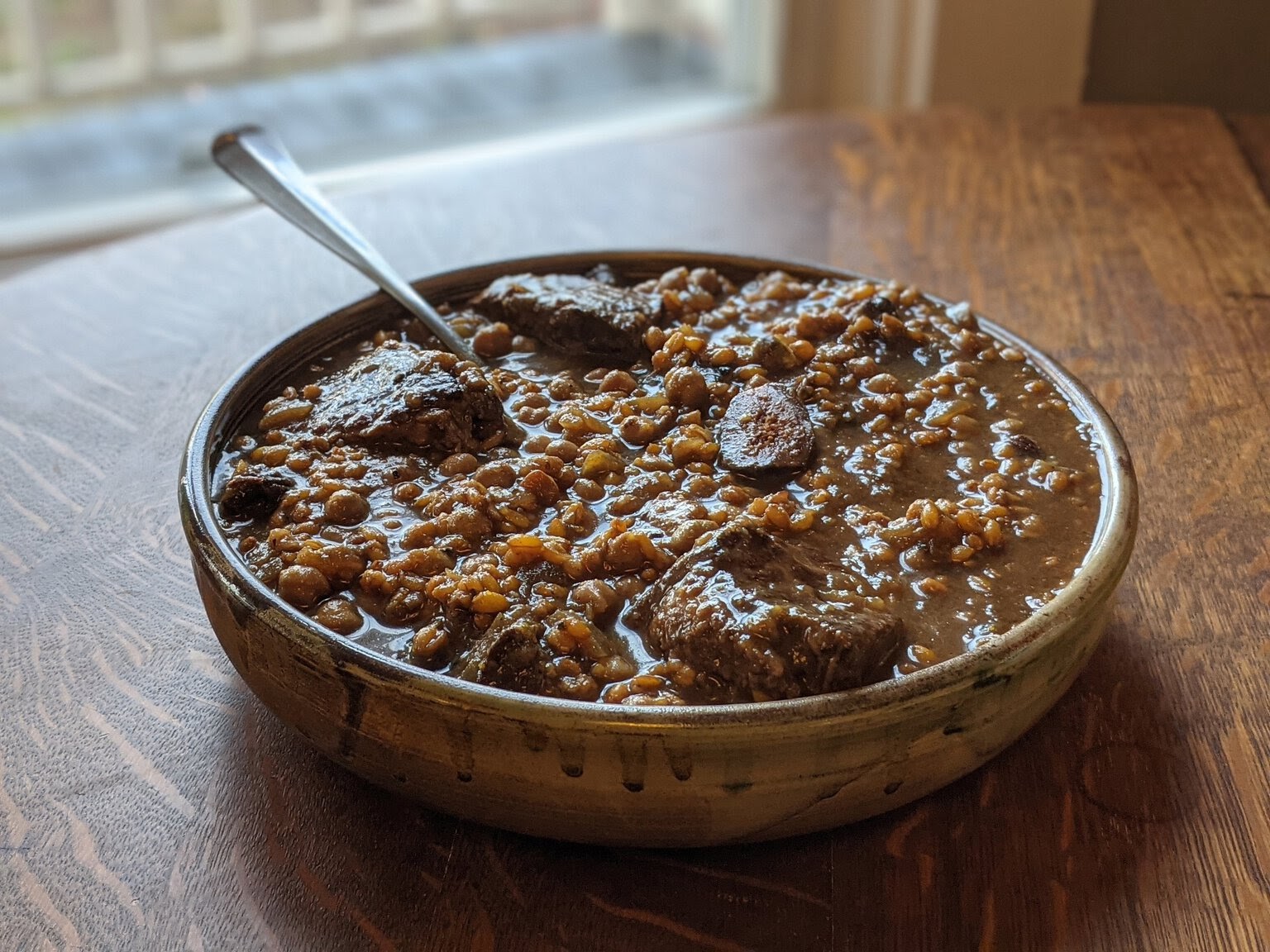This versatile, 1,000-year-old formula for cholent cooks gradually for contemporary solace